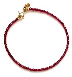 "Ruby, in a rich raspberry red color, the stone of devotion, love, and romance, was chosen for this bracelet. The tiny tag with \"V\" stands for Venexia. If you prefer your custom letter instead, please send a message at checkout. Muladhara red chakras Birthstone - July, Cancer Clasp Material - 14k yellow gold Gemstone - Natural Ruby, 3 - 4mm Ruby earrings to pair, listed individually: https://www.etsy.com/listing/764449244/14k-gold-ruby-studs?ga_search_query=ruby&ref=shop_items_search_5 Siz Gold Birthstone Bracelet, Red Ruby Bracelet, Power Bracelet, Ruby Birthstone, Ruby Bracelet, Ruby Beads, Friend Bracelets, Birthstone Bracelet, Love Bracelet