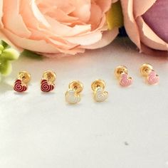 "These adorable 14K solid yellow gold heart stud earrings are the perfect gift for your precious baby girl. The earrings are small and lightweight, with screw backs to ensure a secure fit. The hearts are enameled in a variety of colors to choose from, so you can find the perfect pair to match your baby's style. ♡ 14K Solid Gold  ♡ Suitable for daily wear ♡ Light weight ♡ Hypoallergenic ♡ Nickel free ♡ Waterproof ♡ Tarnish Resistant About BrazilAJ: * \"Welcome to BrazilAJ, a family-owned business Cute Gold Heart Earrings Nickel Free, White Screw Back Earrings For Gift, 14k Gold White Heart Earrings For Gift, White 14k Gold Heart Earrings Gift, Cute Gold Heart Earrings For Mother's Day, Sweet Gold Earrings For Gift, Cute Gold Heart Earrings For Gift, White Heart-shaped Earrings For Birthday, White Heart Shaped Earrings For Birthday