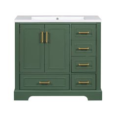 an image of a green bathroom vanity with gold handles and knobs on the doors