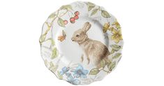 a white plate with a brown rabbit on it