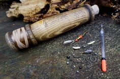 some fishing lures are laying on the ground