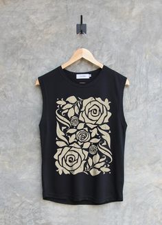 ✿ WELCOME TO MY SHOP ✿ More Shirt ► https://www.etsy.com/shop/igetherproject Material : Polyester 80% Cotton 20% Sleeve length : Muscle tank tops, workout tank tops Styles : Regular Women Fit Printed with eco-friendly water-based inks. Color shirt : Black, Charcoal, Blue, Peach Color print : White & black etc. ■ WASHING INSTRUCTIONS ■ Turn garment inside out. Hand wash. Lay flat to dry. Do not bleach/dry-clean Do not iron directly onto the print ■ Please refer to the size chart in the last image Cotton Screen Print Sleeveless Muscle Tee, Sleeveless Graphic Tee With Screen Print, Summer Graphic Tee With Rose Print, Cotton Sleeveless Muscle Tee With Screen Print, Sleeveless Screen Print Tops For Streetwear, Sleeveless Graphic Print Workout Top, Black Cotton Tops With Rose Print, Sleeveless Cotton Tops With Screen Print, Sleeveless Cotton Top With Screen Print