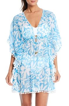 Feel fun and free as you stroll the beach in this cover-up caftan that's sheer, breathable and anchored by darling pompom trim. 34" length (size medium) Slips on over head Deep V-neck with ties Elbow-length sleeves Semisheer 100% polyester Hand wash, line dry Imported Beachwear V-neck Cover-up With Tassels, Summer V-neck Cover-up With Tassels, Summer V-neck Tassel Cover-up, Vacation V-neck Kaftan With Tassel Ties, Blue Tasseled Swimwear For Poolside, Casual Spring Kaftan With Tassels, Spring Casual Tassel Kaftan, Blue Short Sleeve Cover-up For Poolside, Blue Short Sleeve Poolside Cover-up