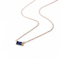 This necklace features a simulated blue sapphire baguette stone on a delicate, diamond-cut cable Gold chain from our signature O Collection. Pair it with other necklaces from this collection. Our patented connectors let you easily link and layer necklaces in any order you desire. Pendant: Height 3mm x Width 7mm Adjustable chain: 15-17in (38-43cm) When layered, chain length is: 15-21in (38-53cm) Learn more Blue Sapphire Baguette Stone Spring clasp closure Hypoallergenic, lead and nickel free #283 Layer Necklaces, Baguette Necklace, Layered Choker Necklace, Layered Chain, Layered Necklace Set, Necklace Blue, Multi Strand Necklace, Diamond Cut, Gemstone Necklace