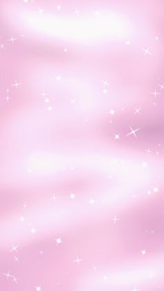 a pink background with white stars on it