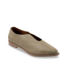 Bueno-Berkley Slip-On Flaunt elegant style wearing the Berkley slip-on from Bueno. Uniquely cut topline and a pointy toe give a contemporary lift to this leather slip-on. The leather lining and footbed along with the durable rubber sole keep you comfortable all through the day. Chic Beige Almond Toe Slip-ons, Chic Pointed Toe Slip-ons With Leather Sole, Chic Beige Slip-ons For Fall, Chic Leather Slip-ons For Work, Chic Pointed Toe Flats For Business, Spring Workwear Plain Toe Slip-ons, Spring Workwear Slip-ons, Slip-on Pointed Toe Flats For Workwear In Fall, Beige Slip-on Pointed Toe Flats For Work