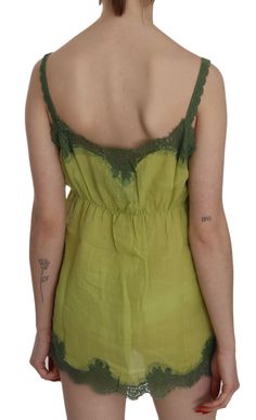 Discover the blend of luxury and natural sophistication with our exquisitely crafted linen tank top from PINK MEMORIES. This chic, green lace blouse brings a touch of elegance to your wardrobe, perfect for those warm, sunny days or layering under a blazer for evening events. Boasting fine Italian craftsmanship, this top is a testament to timeless style and premium quality. Material: 100% Linen Color: Green Country of origin: IT Logo details Green Lace Blouse, Strap Tank Top, Linen Tank Top, Tank Top Blouse, Linen Tank, Spaghetti Strap Tank Top, Green Lace, Pink Blouse, Lace Blouse