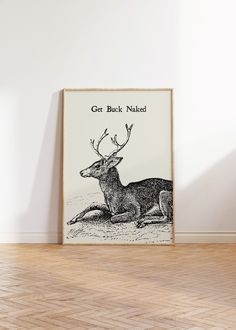 a black and white photo of a deer laying on the ground with text that reads get buck naked