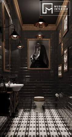 a black and white tiled bathroom with a painting on the wall above the toilet seat