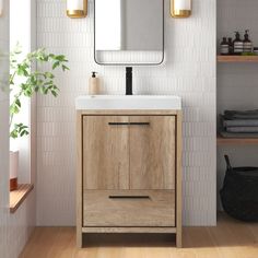 a bathroom with a sink, mirror and shelving unit in the corner next to it