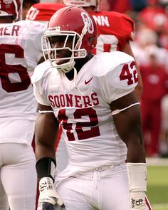 two football players are standing on the field