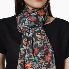 Elevate your style with the Kashmiri Kalamkari Wrap in Black, a unique hand painted scarf crafted from luxurious Merino wool. Experience the beauty of traditional kalamkari art with this must-have accessory. 100% Fine Merino Wool Hand Aari Work Embroidery Outing Kalamkari wraps are hand painted and augmented with intricate hand embroidery on the print of the wrap. One Size: 28 Inch (Width) X 80 Inch (Length) | (71 cm X 203 cm) Ideal & Elegant gift Choice! solve your gifting worries today with so Aari Work Embroidery, Kalamkari Art, Hand Painted Scarves, Painted Scarf, Clothing And Textile, Aari Work, Elegant Gift, Luxury Fabrics, Timeless Pieces