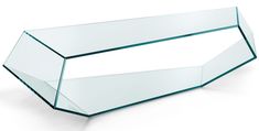 a glass table that is shaped like a box with one section cut out and the other half empty