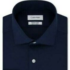 !!! Calvin Klein !!! !!! Sale !!! Retail $85.00!!!! Calvin Klein Offers Versatile Style Ideal For The Modern Male Wardrobe With The Soft Feel, Tailored Fit And Stretch Performance Qualities Of This Solid Dress Shirt. A Slim Fit Is Cut Closer Through The Chest, Sleeves And Waist; Features Slim Armholes And Sleeves Non-Iron Spread Collar Cooling And Anti-Microbial Jade Fiber Technology; Stretch Fabric For A Full Range Of Movement; Everlasting Color Technology That Keeps Color Vibrant Wash.Navy Modern Fitted Calvin Klein Top, Calvin Klein Cotton Shirt For Business Casual, Fitted Calvin Klein Cotton Shirt, Classic Calvin Klein Tops For Business Casual, Calvin Klein Classic Tops For Business Casual, Fitted Calvin Klein Shirt For Work, Calvin Klein Fitted Shirt For Work, Classic Fitted Calvin Klein Shirt, Calvin Klein Cotton Formal Shirt