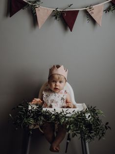 First Birthday Wall Decor, One Year Old Backdrop First Birthdays, Picture Wall First Birthday, One Year Old Birthday Photo Wall, Diy Photo Garland First Birthday, Wildflower Birthday Party, Half Birthday Baby, Fall 1st Birthdays