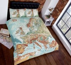 a bed with a large map on it