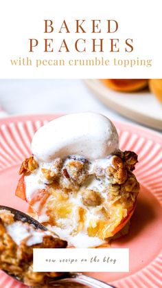 baked peaches with pecan crumble topping on a pink plate next to a fork