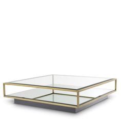 a glass and metal coffee table on a white background