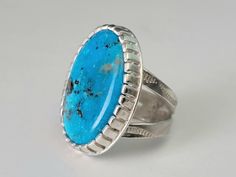 Natural Morenci(AZ.) Turquoise Sterling Silver Ring is a Unique Artist Crafted Statement that will surely get noticed!  Ring is a size 10. This hand crafted designer ring has a sturdy 2 Split band that is a full 3/4" wide at the top, tapering to a sturdy 5/16" wide.  This style of split band will ensure that the ring stays balanced on your finger and stays put on the top of your finger does not spin around.   Notice our signature moose stamp on the bottom(pic). To create this ring, the stone is Turquoise Chrysocolla Rings For Anniversary, Southwestern Blue Chrysocolla Rings, Arizona Turquoise, Natural Turquoise, Ring Handmade, Turquoise Sterling Silver, Statement Ring, Sterling Silver Ring, Moose