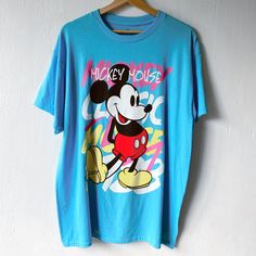 New Without Tags. Unisex Large Mickey Graffiti Tee. Blue Graffiti Print Tops For Streetwear, Blue Graffiti Print T-shirt For Summer, Blue Screen Print Tops For Streetwear, Blue Graphic Print Top For Streetwear, Light Blue Graphic Print Top For Streetwear, Light Blue Graphic Top For Streetwear, Light Blue T-shirt With Cartoon Print For Spring, Retro Blue Cartoon Print Tops, Retro Blue Tops With Cartoon Print