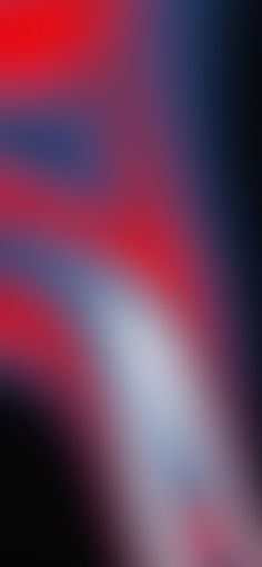 blurry image of red, white and blue colors