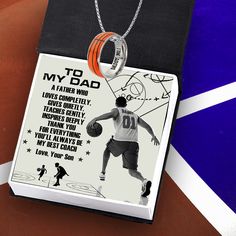 a necklace with a basketball player on it