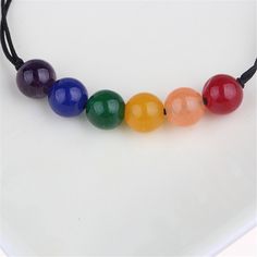 Vibrant rainbow agate beads ensure a fun and whimsical accent to your everyday styles. Beads: 0.31'' W Sliding knot closure String / agate Casual Rainbow Jewelry With Sliding Knot, Casual Rainbow Bracelets With Sliding Knot, Adjustable Hand-strung Rainbow Beads, Casual Rainbow Beaded Bracelets With Sliding Knot, Adjustable Rainbow Hand-strung Jewelry, Adjustable Rainbow Bracelets With 8mm Beads, Rainbow Gemstone Beaded Bracelets, Casual Rainbow Bracelets With 8mm Beads, Rainbow Beaded Bracelets With Gemstone Round Beads