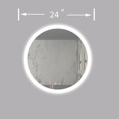 a bathroom mirror with the measurements in front of it and an arrow pointing to the right