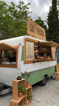 an old camper converted into a food truck