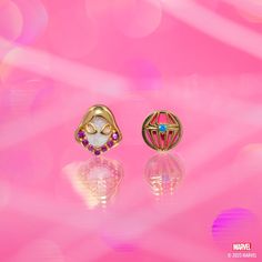 Find your inner Super Hero with our Marvel's Ghost-Spider Studs! No radioactive spider bites required. These studs feature the signature look of Gwen Stacy's alter-ego, Ghost-Spider, embellished with spectacular white and fuchsia stones. The set also includes an eye-catching Ghost-Spider emblem, adding an extra dose of flair to your look. With this accessory, you can channel the fearless and powerful spirit of this Super Hero who's truly amazing. Gwen Stacy Bracelet, Spider Man And Gwen Bracelet, Marvel Jewelry Spiderman, Ghost Spider Hoodie, Spider Stud Earrings, Marvel Jewelry, Spider Bites, Signature Look, Rose Gold Color