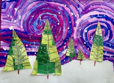 three paper trees are sitting in front of a purple and blue painting with stars on it