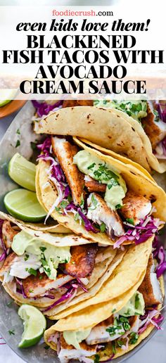 fish tacos with avocado and cream sauce on a plate that has text overlay