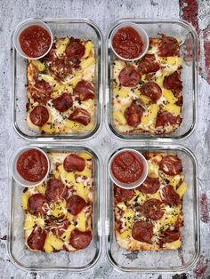 four square pans filled with different types of pizza