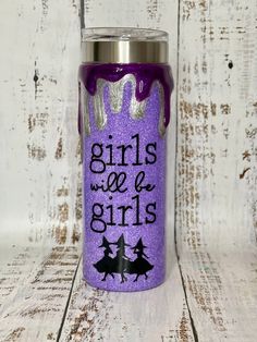 a purple cup with the words girls like girls painted on it and witch silhouettes