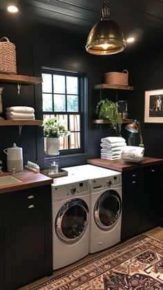 Laundry Black Cabinets, Laundry Room Ideas Industrial Style, Laundry Room Black Ceiling, Black Shiplap Laundry Room Wall, Laundry Room Ideas Black Cabinets, Laundry Room With Wallpaper Ceiling, Industrial Laundry Room Design, Dark Blue Laundry Room Walls, Dark Rustic Laundry Room