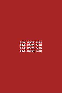 the words love never falls on a red background