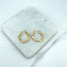 18k Gold Filled Textured Greek Key Hoops Shape Earrings, Cutout Greek Key Hoop, Medium 26mm or Small 19mm Size.Earrings Size:- Medium: Length: 29mm | Width: 26mm | Thickness: 4mm- Small: Length: 22mm | Width: 19mm | Thickness: 4mm Gold Huggie Pierced Earrings, Tarnish Resistant Gold Small Hoop Earrings, Small Hoop Gold Filigree Earrings, Gold Filigree Small Hoop Jewelry, Anniversary Gold Huggie Earrings Pierced, Gold Plated Nickel-free Round Huggie Earrings, Nickel Free Gold Plated Round Huggie Earrings, Small Hoop Gold-tone Pierced Earrings, Small Gold-tone Hoop Earrings, Pierced