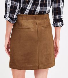 Impeccably cut in luxe faux suede with front patch pockets, this mini skirt is a mod-chic staple with modern appeal. Front zip with button closure. Belt loops. Front patch pockets. Back welt pockets. Lined.,Imported:Imported,Fit:Fit: Shift - fits straight and relaxed,Length:17 1/2" long,Fabrication:Shell: 96% Polyester 4% Spandex, Lining: 100% Polyester,Garment Care:Machine Washable Loft Petite Faux Suede Patch Pocket Mini Skirt Size 2 Toasted Biscotti Women's by Loft Size Petite - 2 Toasted Biscotti Women's Shift, Skirt, Shell:, 96%, Polyester, 4%, Spandex, Lining:, 100%, Polyester, Machine, Washable Trendy Brown Mini Skirt For Work, Brown Mini Skirt With Button Closure For Work, Trendy Mini Skirt With Side Pockets For Work, Fall Fitted Suede Skirt, Brown Mini Skort For Workwear, Fitted Leather Mini Skirt With Pockets, Fitted Suede Skirt For Fall, Chic Brown Skort For Workwear, Fall Skort With Button Closure For Workwear