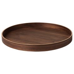 an oval wooden tray on a white background