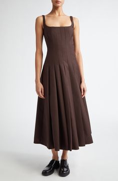 Emilia Wickstead's immaculate elegance pervades this cleanly pleated dress fashioned in a hickory-inspired hue from pure wool. Hidden back-zip closure Square neck Sleeveless Lined 100% wool Dry clean Made in the UK Designer Clothing Classic A-line Midi Dress With Box Pleat, Fitted A-line Dress With Accordion Pleats, Classic Pleated Dress With Fitted Bodice, Classic Dress With Pleated Detail And Fitted Bodice, Classic A-line Pleated Dress For Formal Occasions, Classic Dresses With Pleated Fitted Bodice, Classic Formal Pleated Dress With Pleated Back, Structured Pleated Evening Dress, Brown Pleated Evening Dress