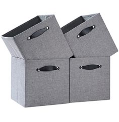 two grey storage bins with handles on each side