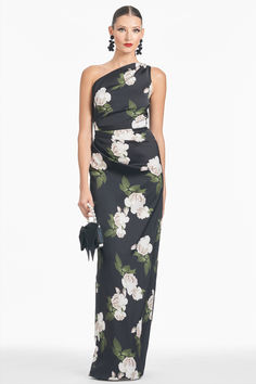 Delancy is our take on the one-shoulder, wear-on-repeat gown. The printed satin crepe cutie, featured in our Obsideon Blooms print, flatters in all the right places. A sash adorns the shoulder to add visual intrigue. Timeless yet modern, this gown will be on your black tie rotation. Fitted One Shoulder Dress With Floral Print For Evening, Elegant One-shoulder Printed Dress, Elegant One Shoulder Printed Dress, Elegant Fitted One Shoulder Dress With Floral Print, Elegant Fitted One Shoulder Floral Dress, One-shoulder Evening Dress With Floral Print, One-shoulder Floral Dress With Asymmetrical Neckline For Evening, Floral Print One Shoulder Evening Dress With Asymmetrical Neckline, One Shoulder Dress With Floral Print For Evening