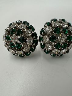 Christian Dior earrings Clip closure Emerald green and brilliant white crystals Hallmarked Christian Dior, Made in Germany 63 Excellent condition Diameter 1.8cm *All items in our collection are authentic and unique. They have already had a previous life, the presence of imperfections or stains are part of the beauty and preciousness of the garment. Help us spread the culture of reuse and protect nature from waste. * No exchanges are made, do not hesitate to ask us for further information. Christian Dior Earrings, Protect Nature, Dior Earrings, Dior Vintage, Vintage Christian Dior, White Crystals, Earrings Clip, Previous Life, Emerald Green