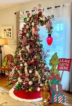 a decorated christmas tree in a living room