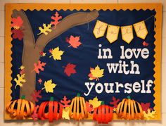 a bulletin board with pumpkins and fall leaves on it, in love with yourself