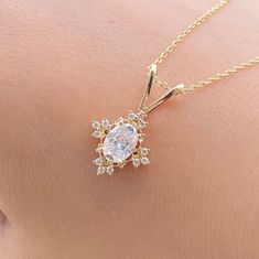 Oval Brilliant Cut Moissanite Pendant 14K Yellow Gold Wedding Pendant Necklace 1.0 TCW Solitaire Charm Pendant Special Gift for her ♠  Stone Details ☛ Stone Weight:  1.0 TCW Oval/Round Cut Moissanite ☛  Gemstone: Moissanite ☛  Stone Color (White) ☛  Stone Luster: Excellent ☛  Stone Clarity: VVS1 ☛  Stone Make: High Quality ☛  Stone Shape: Oval/Round Cut ☛  Metal Change(10k/14k/18k White/Yellow/Rose Gold) ☛  Handmade item ★ Moissanite Guarantee :   Test By Diamond Tester Its Test Show Positive 100% I accept custom-making orders. please contact me if you need this service. All the jewelry in my store is handmade .it may take 2-3 weeks to finish. ♣ Buy with Warranty: ☛ 14 Days Money Back Guarantee; ☛Excellent Customer Service; ☛  Free Shipping and insurance WORLDWIDE; ☛ Free Gift Box. ♣ Shipp Luxury Oval Pendant Diamond Necklace With Accents, Luxury 22k Gold Oval Jewelry, Oval Stone Necklace, Luxury Jewelry With Detachable Oval Pendant, Luxury Oval Pendant For Jewelry Making, Wedding Diamond Necklace With Vvs Clarity Marquise Shape, Diamond Solitaire Halo Necklace For Wedding, Wedding Marquise Diamond Necklace With Vvs Clarity, Diamond White Oval Pendant Diamond Necklace For Wedding