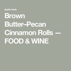 the words brown butter pecan cinnamon rolls food and wine are in white letters on a gray background