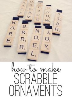 scrabble ornaments are arranged on a table with the words how to make scrabble ornaments