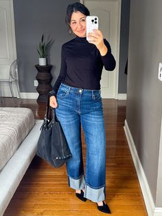 I tried on a bunch of cuffed jeans to find which is the best pair. These are a great basic go-to cuffed wide leg pair of jeans. Super stretchy; super comfortable and a good standard medium blue wash. More options when you click through. | #TheMomEditStyle #FashionBlog #CuffedJeans #DenimTrends # Cuffed Jeans And Ankle Boots, How To Wear Cuffed Jeans 2024, Wide Cuffed Jeans Outfit, How To Style Cuffed Jeans, Cuffed Jeans With Boots, Big Cuff Jeans Outfit, Wide Cuff Jeans Outfit, How To Cuff Your Jeans, Cuffed Jeans Outfit 2024