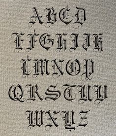 an old fashioned font that has been made into some type of lettering